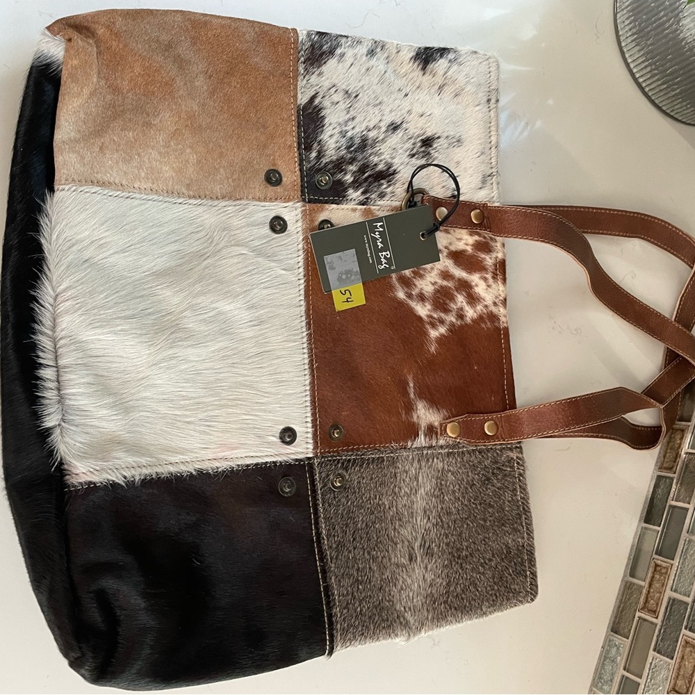 S1163 multi patch cowhide tote